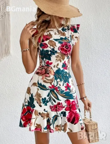 Еластична свободна рокля в бяло на цветя с паднал ръкав размер Л