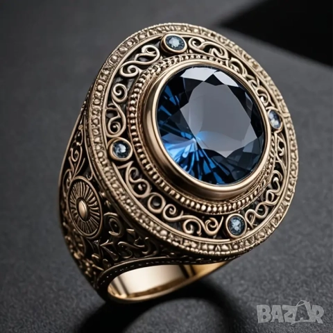 Пръстен в златен цвят, със сапфир
