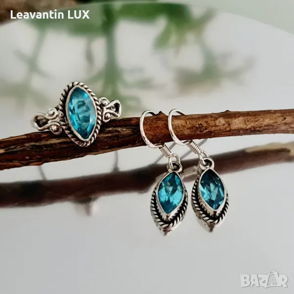 5739
Сребърен пръстен и обеци със син Топаз  , снимка 1