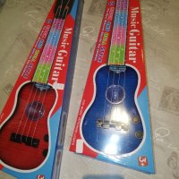 детска китара с струни и батерии. , снимка 1 - Музикални играчки - 43523986