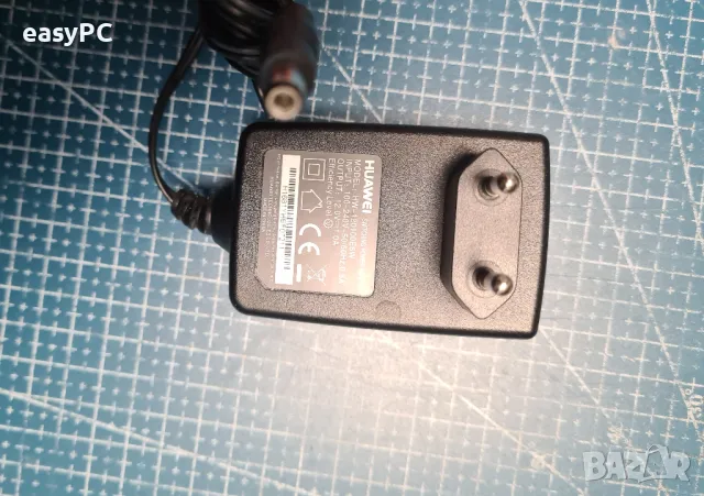 Оригинален захранващ адаптер HUAWEI HW-120100E6W 12V 1.0A , снимка 4 - Друга електроника - 48917617