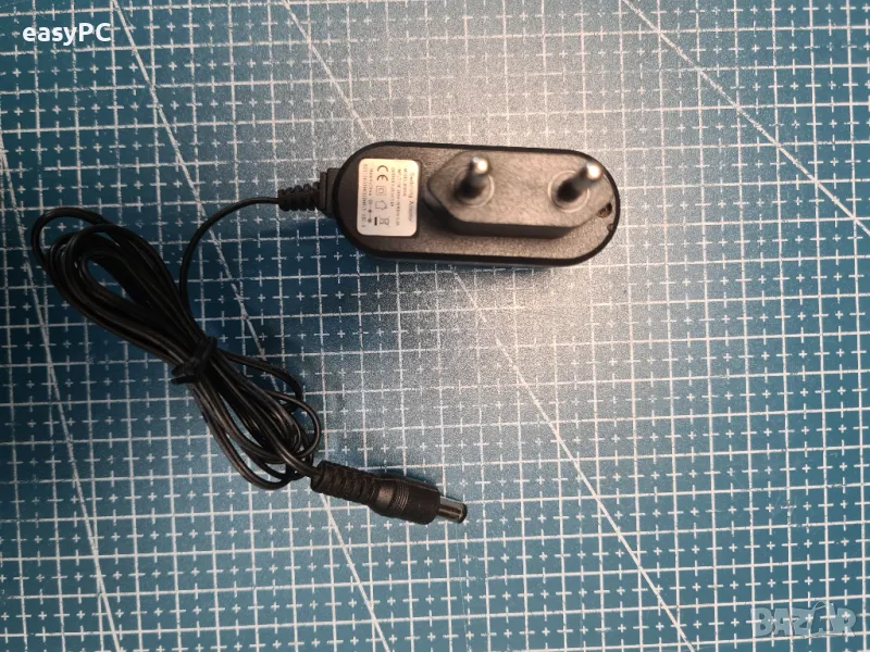 Оригинален захранващ адаптер 005D05 5V 1A, снимка 1