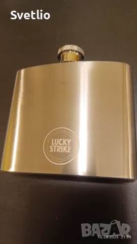 Намалена! Продавам нова джобна бутилка (манерка) за алкохол LUCKY STRIKE.