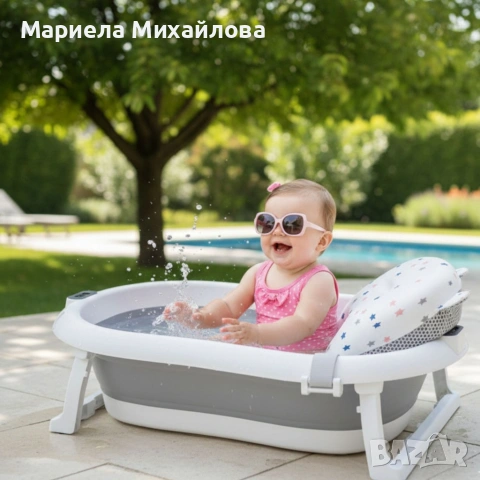 Сгъваема бебешка вана с термометър и възглавница.
