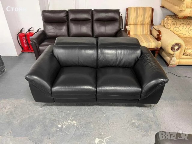 Черен кожен диван двойка с електрически релаксиращ механизъм, снимка 1 - Дивани и мека мебел - 39973439