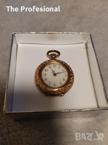 Златен часовник.