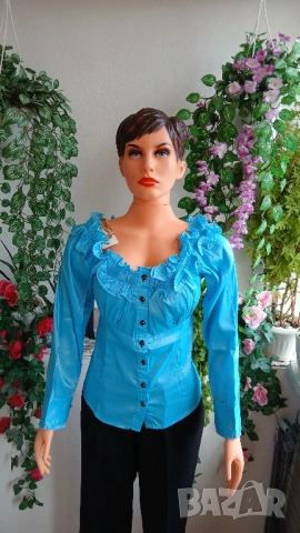 Дамска стилна и луксозна еластична блуза от копринен сатен.