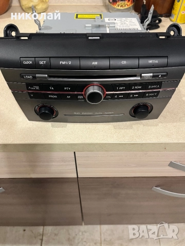 Радио панел за mazda 3 2007 г, снимка 2 - Аксесоари и консумативи - 52792715