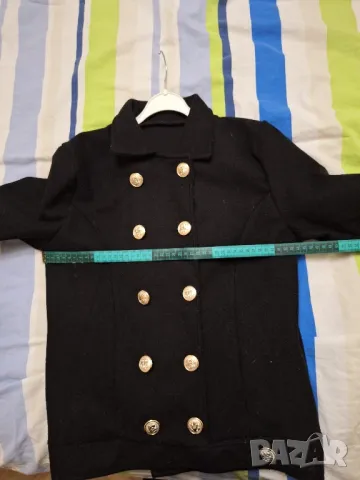 Късо черно палто,гр.об.44см.