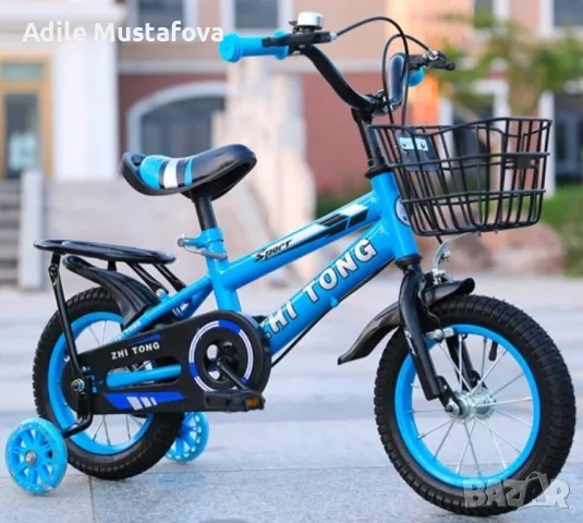 Детски велосипед с кош и помощни колела. С рамка от въглеродна стомана и стабилни гуми , снимка 1