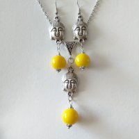 Красив комплект бижута Буда с жълти порцеланови мъниста и медальони в цвят сребро , снимка 1 - Бижутерийни комплекти - 33348065