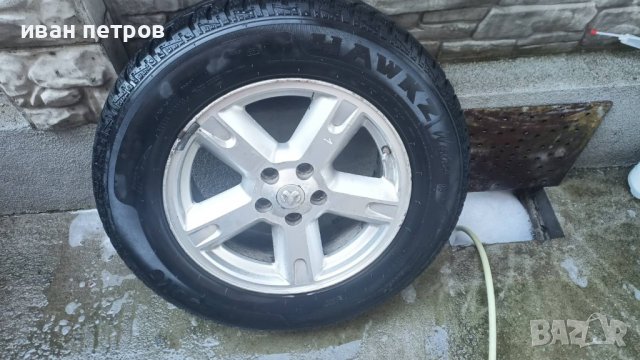 Зимни гуми с джанти 235/65R17, снимка 1 - Гуми и джанти - 37344683