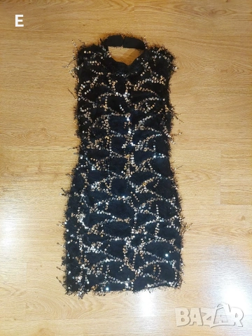 Дамска черна рокля.