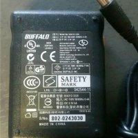 Оригинално зарядно устройство Buffalo 3.3V 2.0A 5.5mm x 2.5mm AC Зарядно устройство PSU UIA312-3320, снимка 1 - Кабели и адаптери - 32315253
