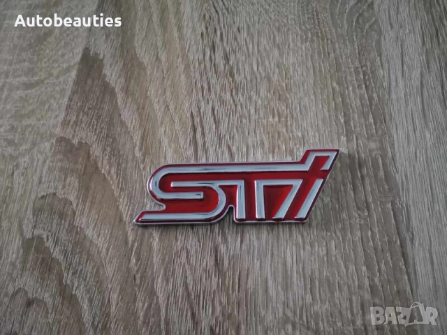 Subaru STI червена метална емблема 
