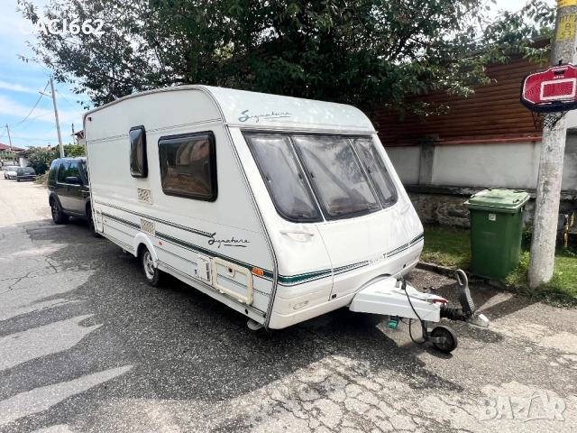 Каравана swift signsture 2001г, снимка 2 - Каравани и кемпери - 53365422