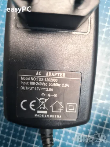 Оригинален захранващ адаптер TDX-1202000 12V 2.0A