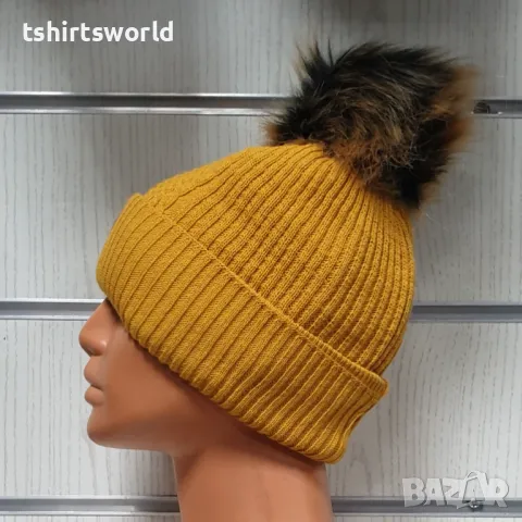 Нова зимна дамска шапка SilverStar в жълт цвят с пух/помпон, снимка 3 - Шапки - 47927832