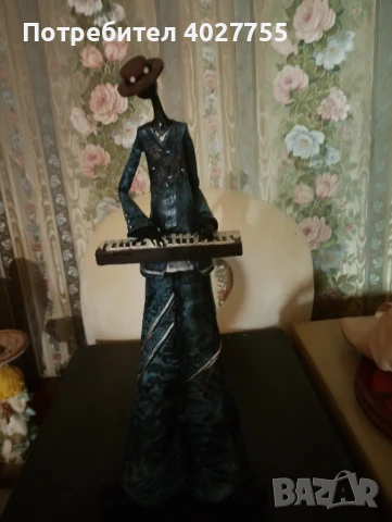 Статуетка музикант полеризин