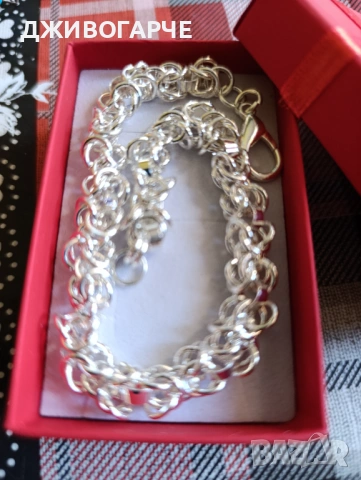 Нова,масивна сребърна гривна. Дълга и широка. В луксозна, подаръчна кутия.