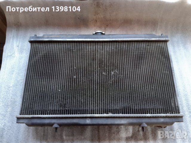 Радиатор за нисан примера п12 2.2д, снимка 1 - Части - 28007595