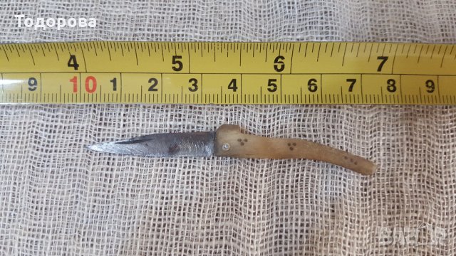 Миниатюрна ножка от стомана,кост и месингови набивки