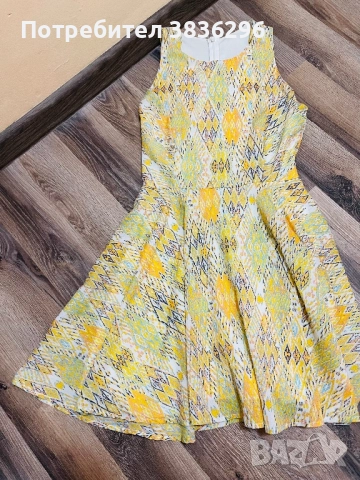 Елегантна дамска рокля.