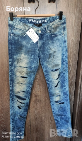 Caramella Fashion нови с етикет уникални дънки с разрези, снимка 10 - Дънки - 52815944