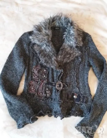 Уникална и топла жилетка