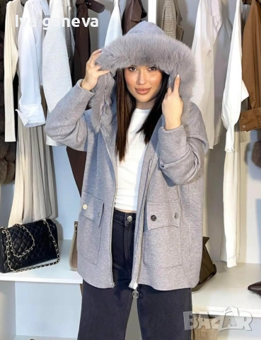 Жилетка с пух 