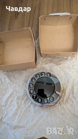 Номероизбирателен механизъм за ретро телефон.