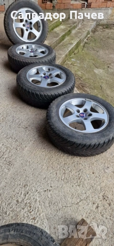 Зимни гуми195/65/R15 с аломиниеви джанти, снимка 2 - Гуми и джанти - 52977715
