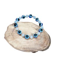 Ластична гривна с кристали и синьо око , снимка 1 - Гривни - 43706993