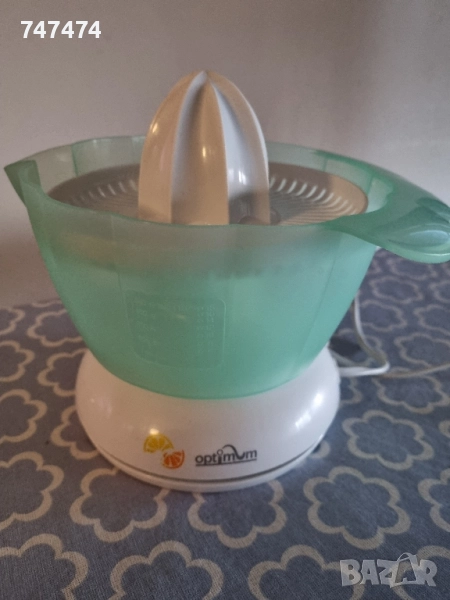 Електрическа цитрус преса Optimum., снимка 1