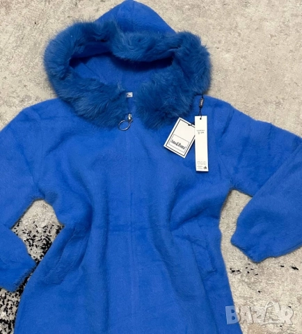 жилетка с пух 