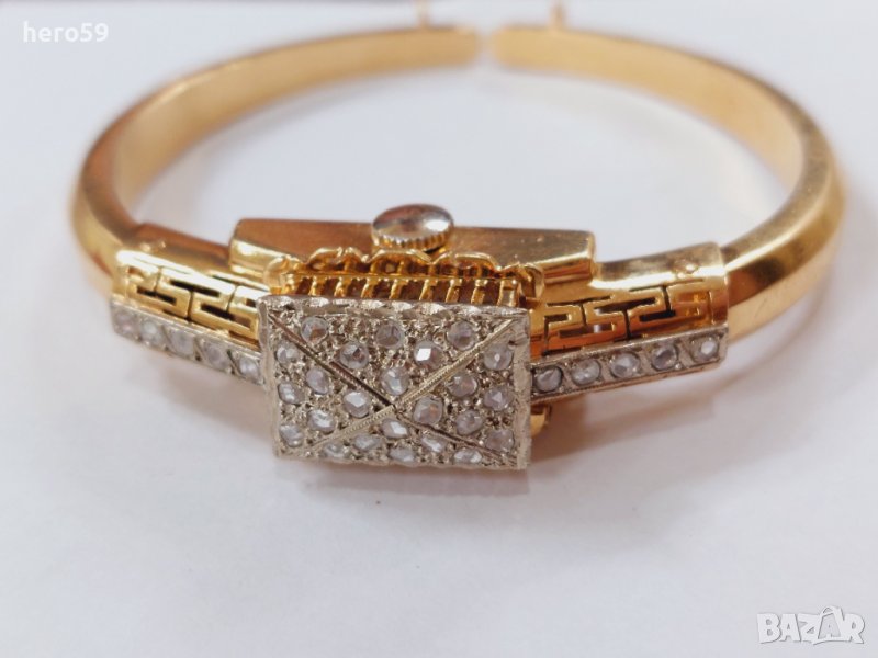 Дамскa златнa гривна-часовник 18 карата с 34 диаманта.Датира от началото на 20 век,марка Венус, снимка 1