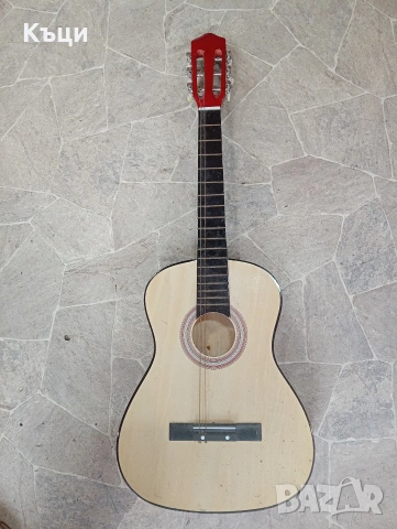 Китара детска на цена от 10евро.