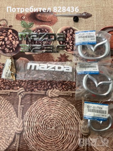 Емблеми Mazda нови