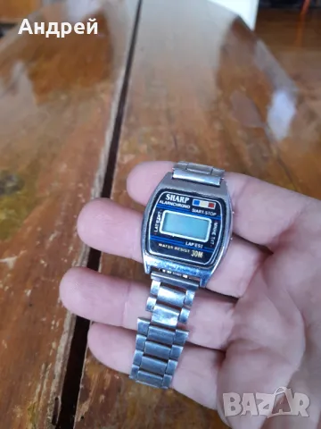 Стар електронен часовник Sharp, снимка 2 - Антикварни и старинни предмети - 49709477
