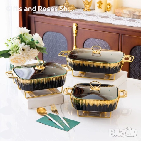 Съд за топло сервиране в черно и златно с две подгряващи свещи