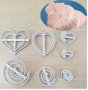 7 бр сърца и въртели пластмасови резци форми украса фондан торта декор, снимка 1 - Форми - 28594670