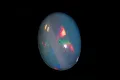 Етиопски опал 1.81ct овален кабошон, снимка 3