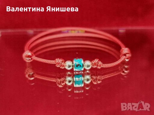 Дамска, детска или бебешка гривна със сребърен елемент, син емайл и делфини, снимка 1