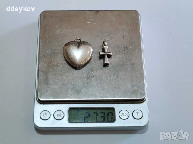 Ръчно изработени сребърно сърце и кръст с тегло 27,30 грама.