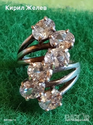 Изящен сребърен пръстен с ювелирно инкрустирани кристали Сваровски 26393