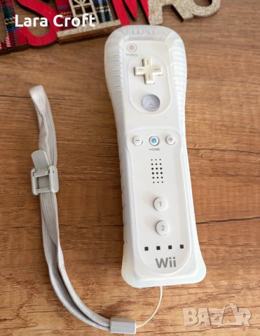 Wii Оригинален контролер + оригинално силиконово протекторче
