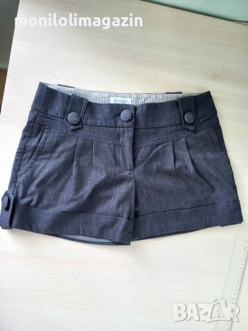 Немски къс панталон, обличан веднъж, няма дефекти, талия 37см.