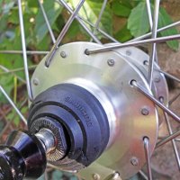 Динамо главина/капла/за диск и v brake 28*29 Shimano, снимка 6 - Части за велосипеди - 37635769