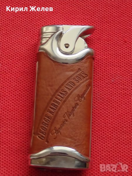 ЛУКСОЗНА ЗАПАЛКА GEORGE KARELIAS AND SONS МЕТАЛ И КОЖА РАБОТИ ПЕРФЕКТНО СЪСТОЯНИЕ 34118, снимка 1