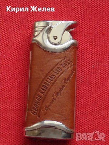 ЛУКСОЗНА ЗАПАЛКА GEORGE KARELIAS AND SONS МЕТАЛ И КОЖА РАБОТИ ПЕРФЕКТНО СЪСТОЯНИЕ 34118